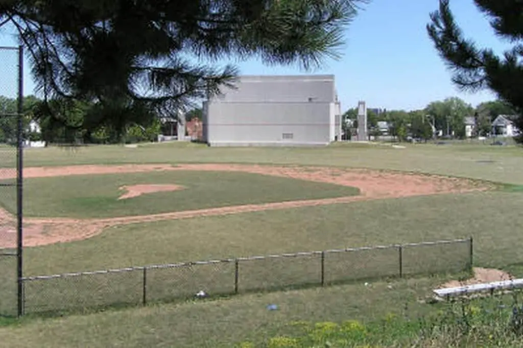 View of the baseball field from behind the home plate.