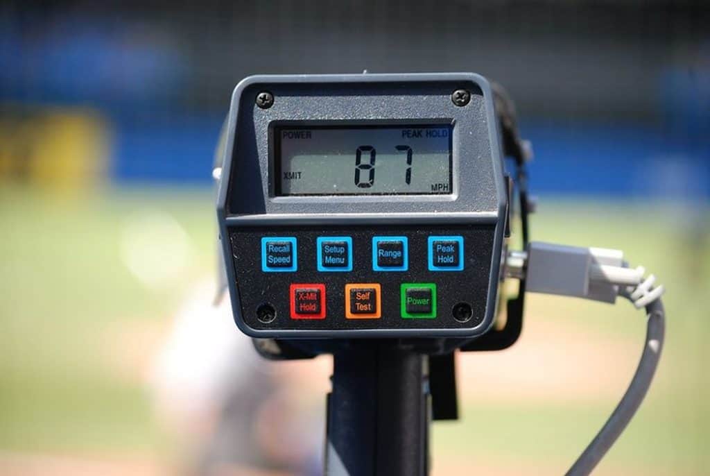 Baseball radar gun measures speed.