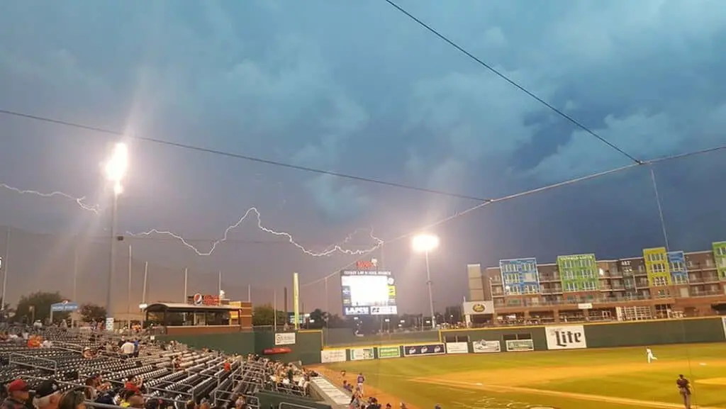 Storm with lightning over baseball field