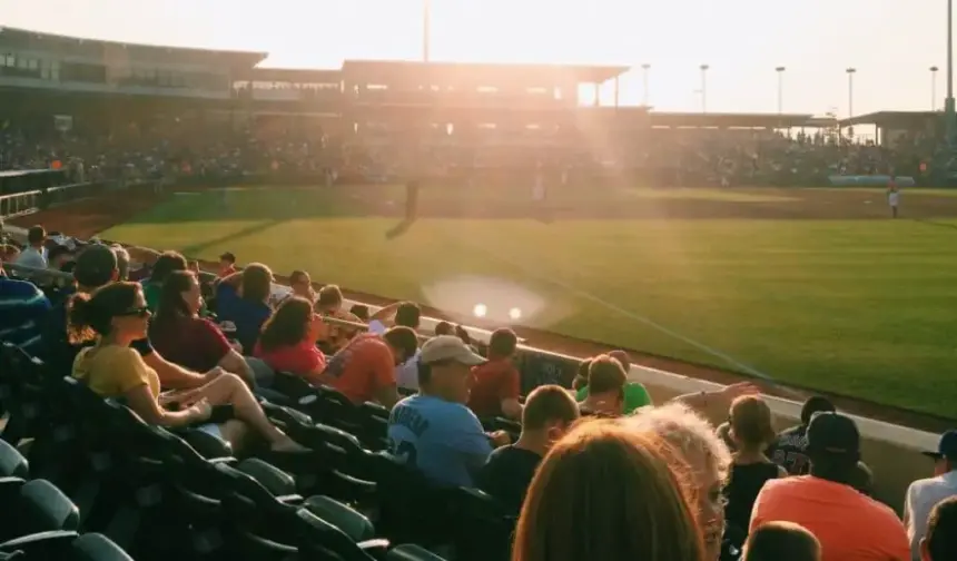 Baseball game in bright sun.
