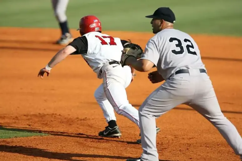 Baseball player in tight pants.