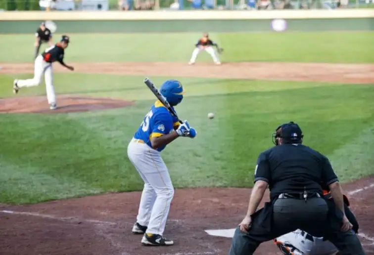 Batter in college baseball ready to bat.