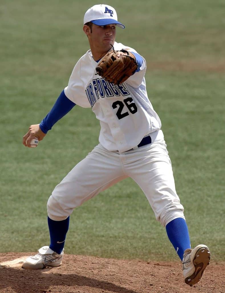 Air force falcons baseball player pitching underhand.