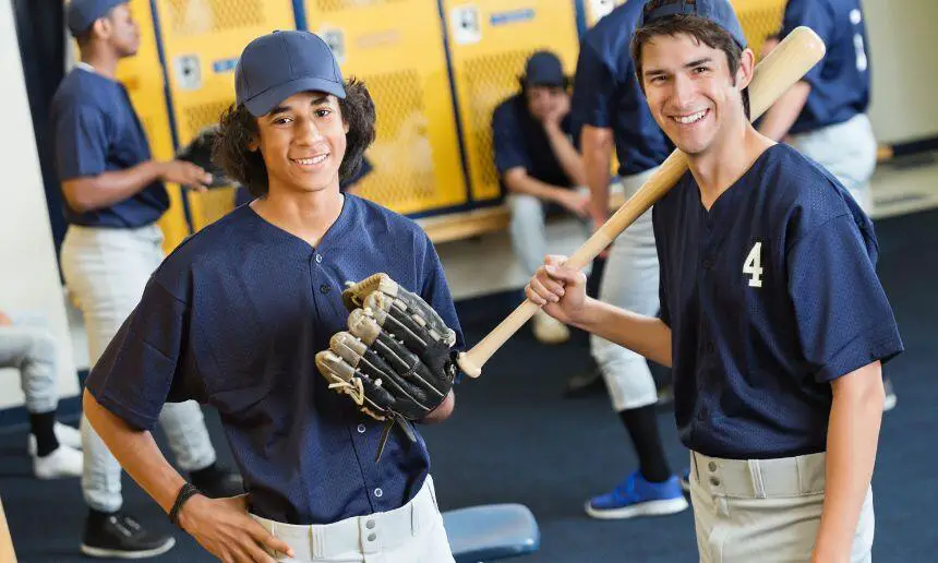 High school baseball player with wood bat.