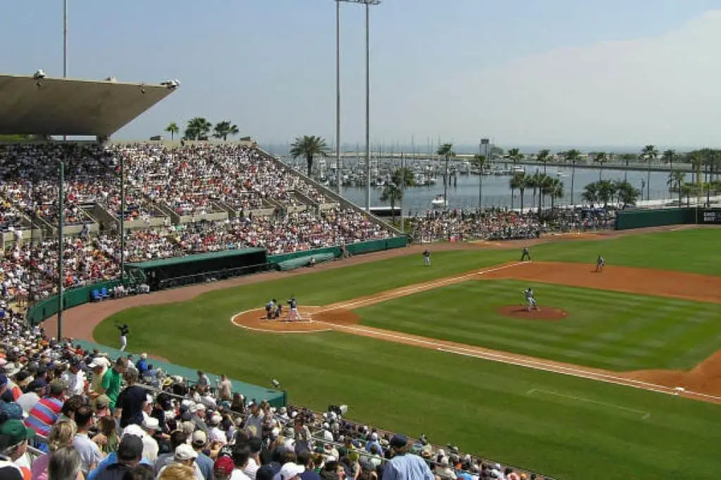 View of the baseball field with the ocean in background.